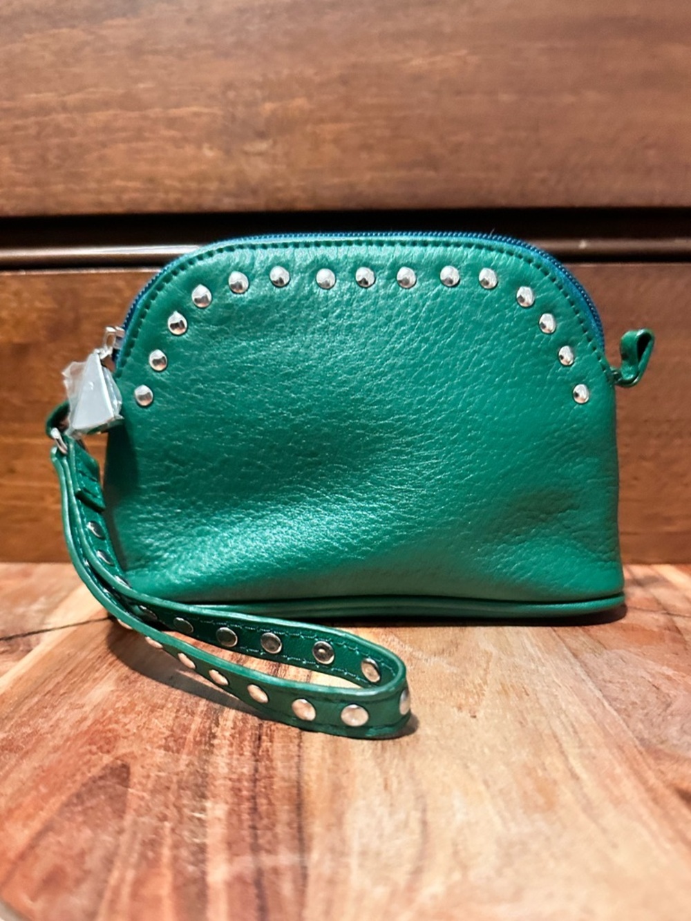 green studded pouch